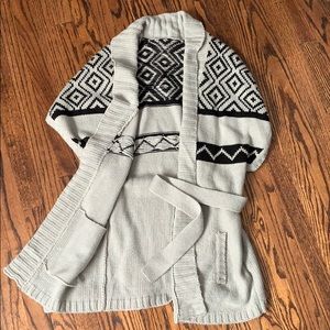 Boutique long sleeveless sweater